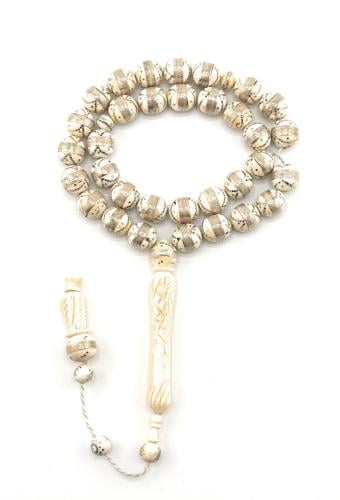 مسبحة مصنوعة من العاج الأصلي المطعم بالفضة النقية