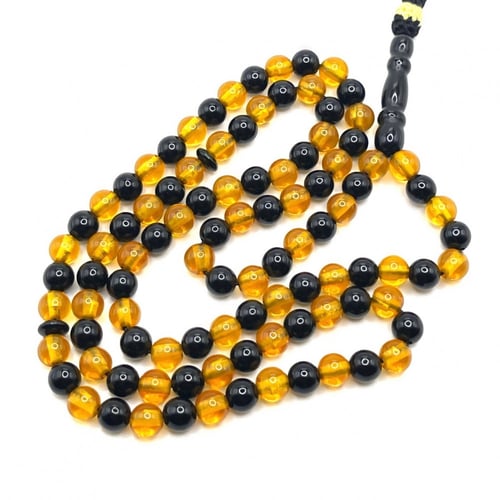 سبحة كهرمان مع يسر