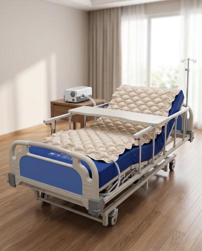 Premium electric medical bed with a pressure-relief mattress and a foam mattress.