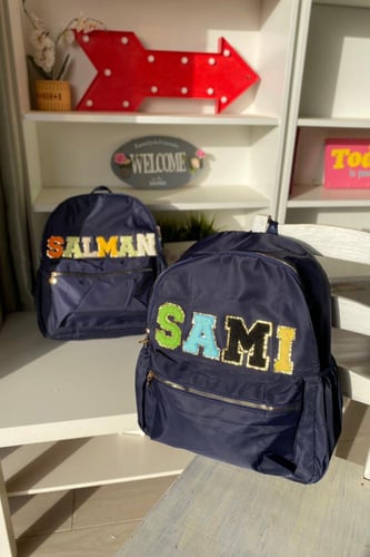 شنطة ظهر بالإسم (كحلي)