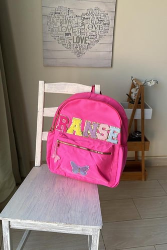 شنطة ظهر بالإسم (بنك)