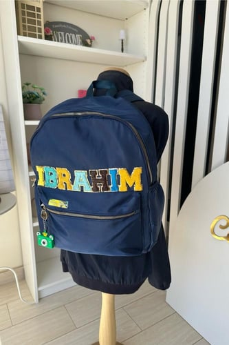 شنطة ظهر بالإسم (كحلي)