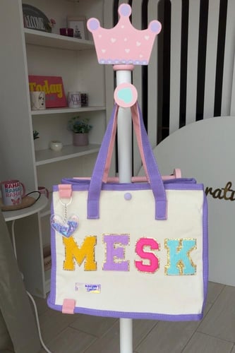 شنطة بالإسم (موف)