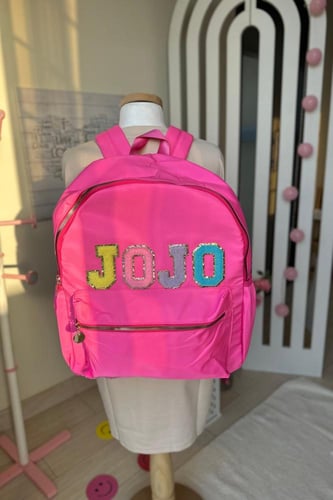 شنطة ظهر بالإسم (بنك)