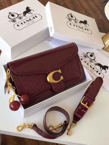 شنط كوتش تابي جلد