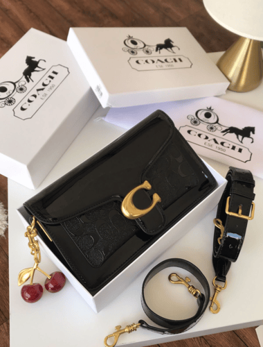 شنط كوتش تابي جلد