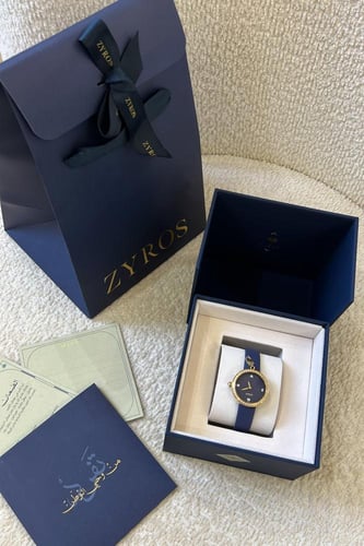 ساعة نسائية بسير ربل بلون - كحلي