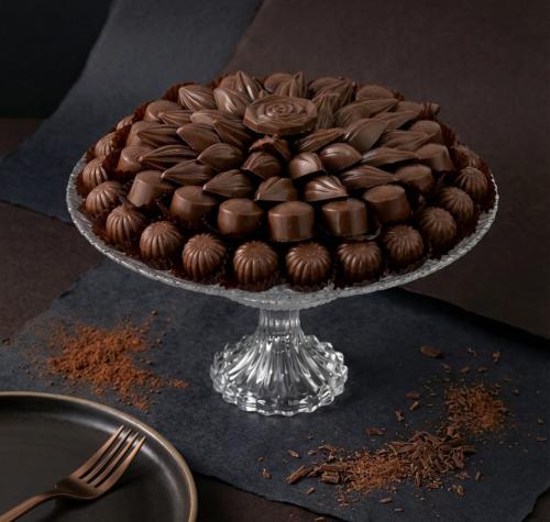 Uncovered chocolate with caramel, almond filling,...