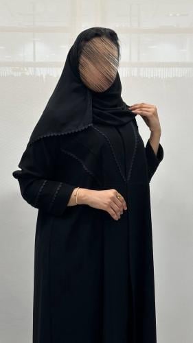 عباية وديان كلوش بقماش سراميك اسود فاحم كسرات جوانب مع تحديد كلفه