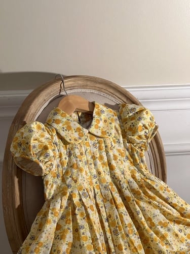 فستان اصفر مورد ب كسرات 2024 .