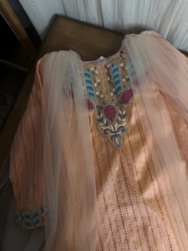 جلابية برتقاليه .