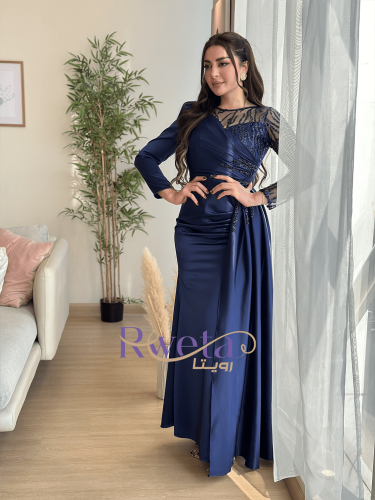 فستان سهرة كحلي مع ذيل بالجنب