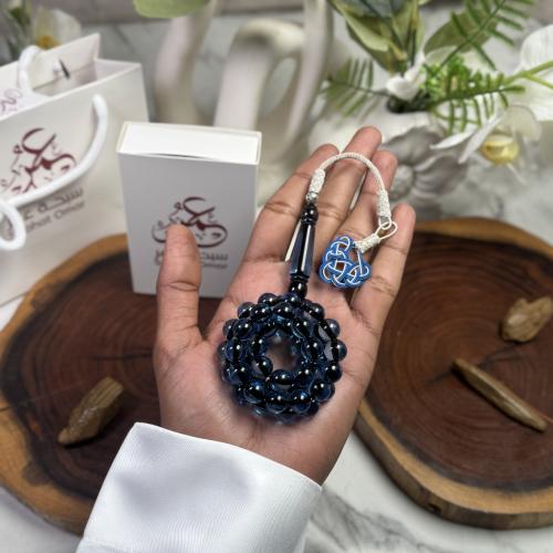 مسباح بكلايت أزرق شفاف طربزونة