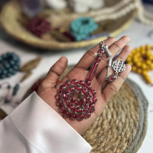 مسباح بكلايت شفاف خيط أحمر