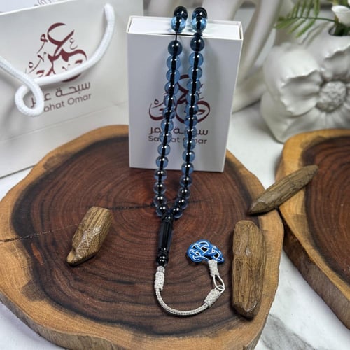 مسباح بكلايت أزرق شفاف طربزونة