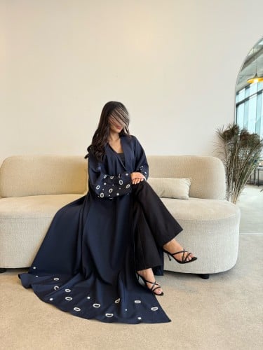 Abaya with a half-kilosh style, with embellishments on the sleeves and the bottom of the abaya.