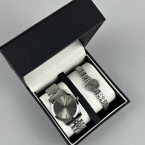 ساعه نسائي و رجالي ميناء فضي