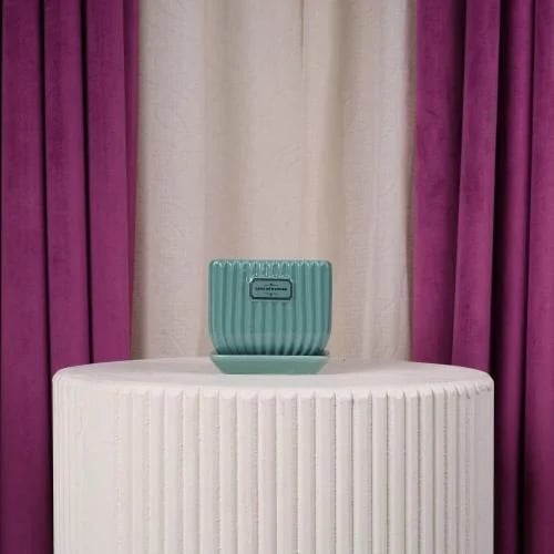 Small green ceramic flower vase