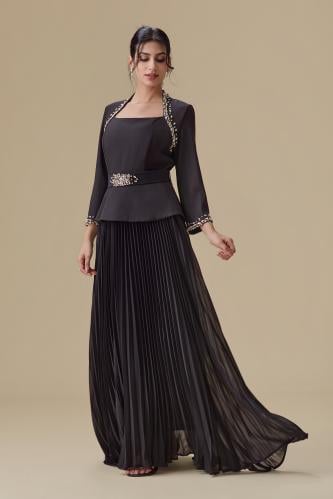 Long evening dress with tulle details and a luxurious crystal belt
