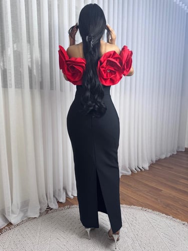 فستان اسود ماسك بورود احمر