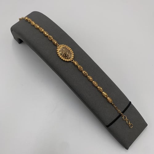 طقم ذهب بحريني عيار 21 بتصميم دائري متدلٍ وزن 20.6...