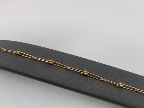 سوارة إيطالية ذهب عيار 18 بتصميم حلقات متصلة وكرات...