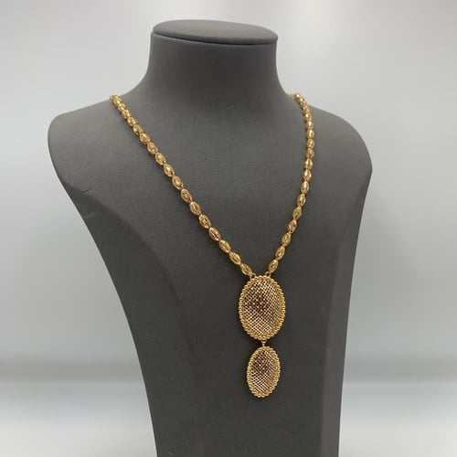 طقم ذهب بحريني عيار 21 بتصميم دائري متدلٍ وزن 20.6...