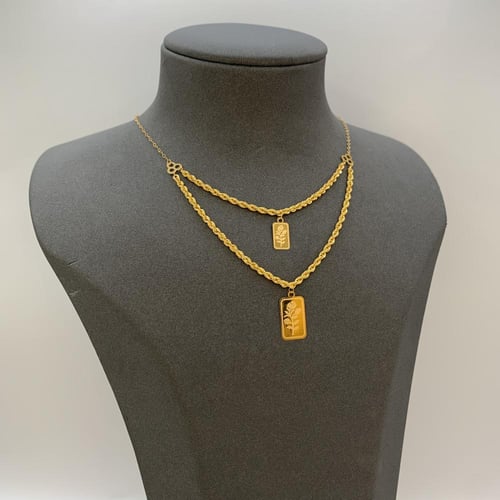 عقد ذهب عيار 21 وزن 2.4 جرام بتصميم طبقتين وتعاليق...