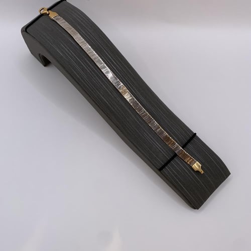 سوارة بحريني ذهب عيار 21 وزن 6.95 جرام بتصميم عريض...