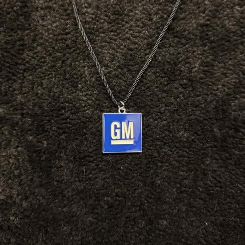 تعليقه بشعار جي ام GM معدن