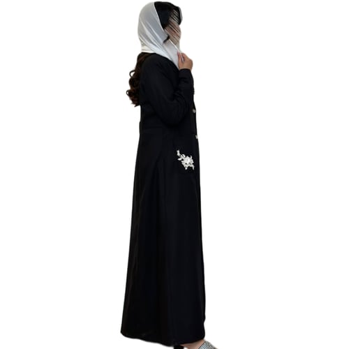 بليزر كتان لون أسود مزين بقطع شك بيضاء