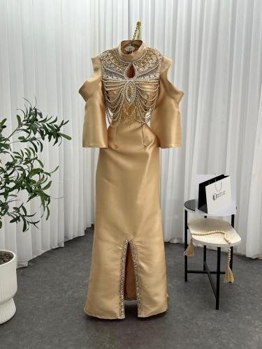 فستان سهرة ذهبي مطرز باللؤلؤ