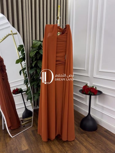 فستان سهرة برتقالي بكتف واحد وذيل ناعم