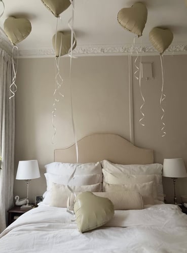 Full bed with beige stripes