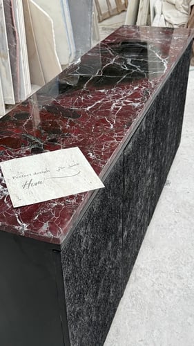 Buffet table with burgundy marble surface