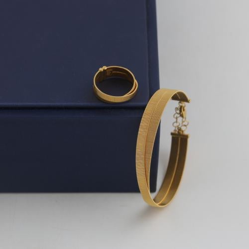 Double silk 21 karat gold bracelet and ring