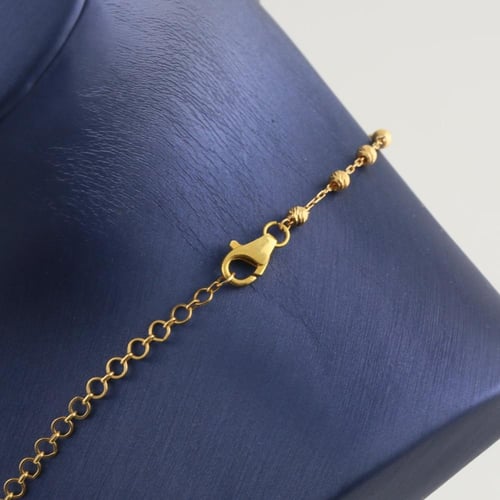 طقم ذهب بتصميم كرات الليزر البراقة - عيار 21