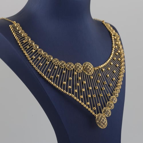 طقم ذهب جناح اعمدة و كرات لماعة - عيار 21