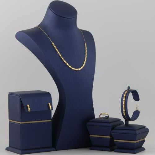 طقم ذهب مميز سداسي لماع و مزحرف - عيار 21