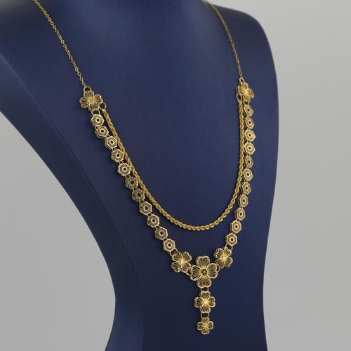 طقم ذهب دورين مبروم هندسي و ورود - عيار 21