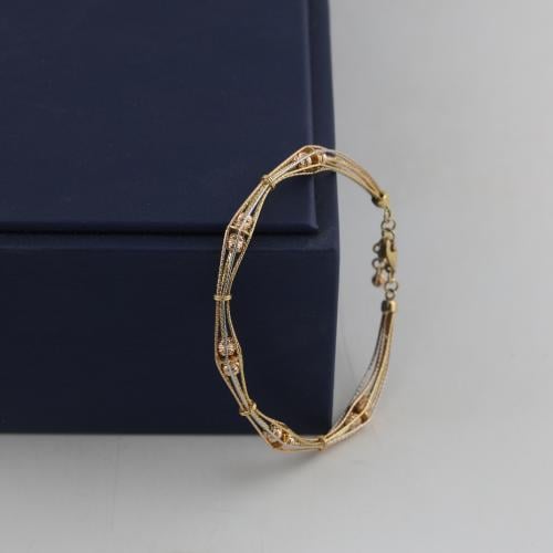 Gold bracelet with standing colorful shining columns - 18 karat