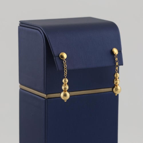 طقم ذهب حلقات مع كرات الليزر - عيار 21