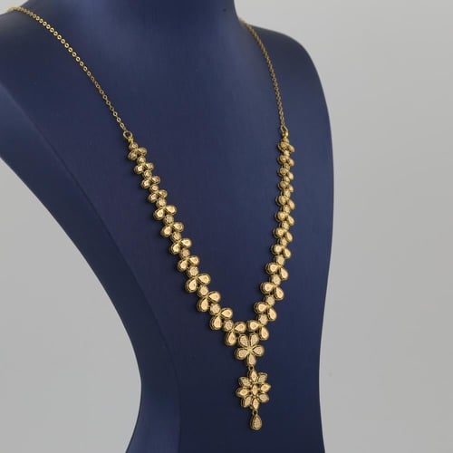 طقم ذهب بتصميم ورود مميز ملفت - عيار 21