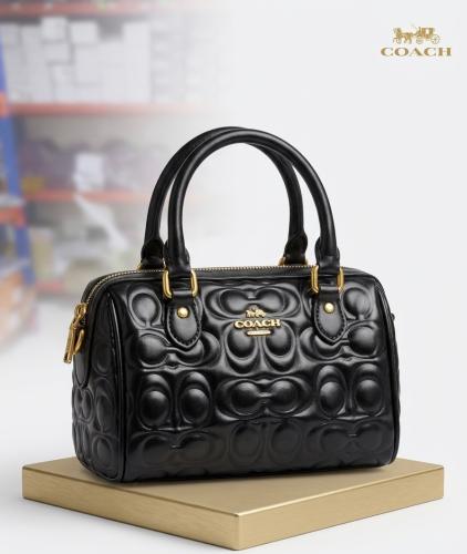 شنطة COACH النسائية الفاخرة – تصميم أسود منقوش بلم...