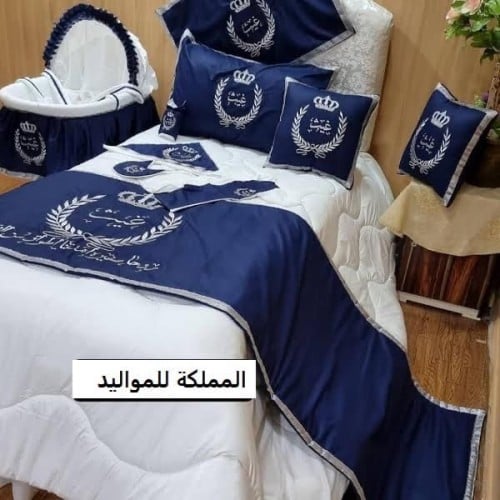 طقم استقبال مواليد بتصميم انيق وجذاب (12 قطعة)