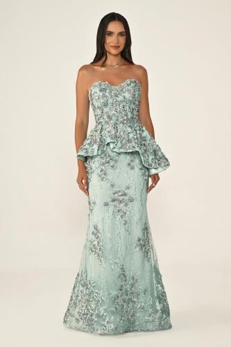 A dress embroidered with flowers with a mermaid sk...