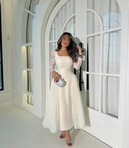 فستان العيد أبيض فاخر بتصميم راقي