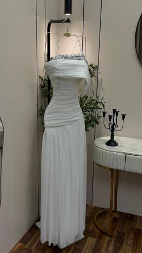 White dress with pleats