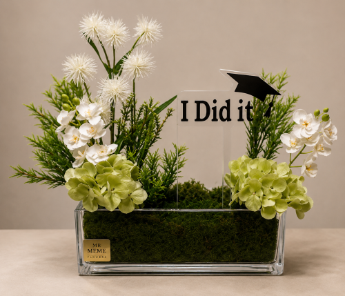 Glass vase with artificial flowers