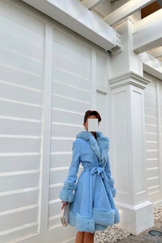 A luxury blue coat with fur